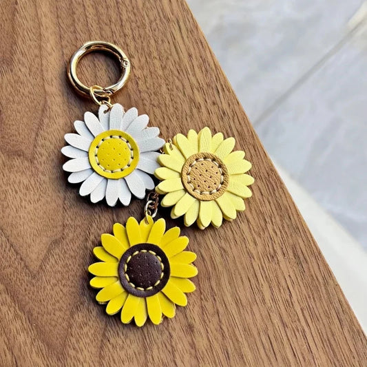 Handmade Leather Daisy Sunflower Bag Charm – Triple Floral Keychain & Handbag Pendant | White, Yellow & Brown Leather Flowers | Elegant Women’s Gift Accessory